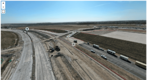 Construction Project 360 imagery Example showing some trucks and earthwork stage.